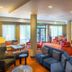 Courtyard by Marriott Charleston Downtown/Civic Center lobby lounge with colorful seating and large windows
