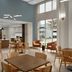 Hampton Inn & Suites Charlotte Ballantyne breakfast area with tables, chairs and large windows