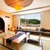 Honjin Hiranoya Kachoan in Takayama: tatami room with low table, floor cushions, and large window view
