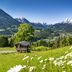 Karma Bavaria in Schliersee with alpine meadow, wooden cabin, and snow-capped mountain views