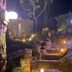 Nighttime garden steps at Rendezvous Mendocino in Gualala with lit pathway and rustic stone landscape