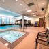 Fairfield Inn & Suites by Marriott Ottawa Airport indoor pool with a hot tub and lounge chairs in Ottawa