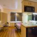 Motel 6 Bernalillo room with kitchenette, microwave, bed and desk