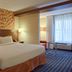 Fairfield Inn & Suites by Marriott Harrisburg Hershey guest room with king bed and window seating