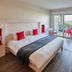 Hôtel Miléade La Frégate - Bidart room with balcony and sea view, red accents and double bed