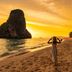 Aonang Sr Bungalow in Ao Nang with a sunset beach view and limestone island offshore