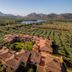 I Giardini di Cala Ginepro Hotel Resort in Cala Liberotto with terracotta roofs and mountain views