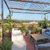Il Camaleonte dal 2005 in Bracciano: rooftop terrace with lounge seating and town views