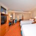 Fairfield Inn and Suites by Marriott Williamsport guest room with two beds and desk