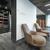 Courtyard by Marriott Toledo West market area with snack shelves and lounge chairs in Toledo
