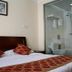 Beijing Northern Langyue Hotel Financial Street Branch guest room with glass-enclosed bathroom in Beijing