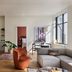 Roost Detroit in Detroit: bright modern suite with seating area, dining table, and large windows