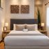 Posada Mayor de Migueloa in Laguardia: cozy guest room with double bed, bedside lamps and window curtains