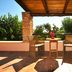 Elia Hotel & Spa, Kolymvari: shaded terrace with table, chairs and garden view
