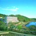 Kagamigaike Hekizantei in Nihonmatsu with a lakeside view and green hillside surroundings