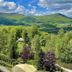 Belweder in Ustroń with mountain views over a lush green landscape and terrace seating