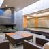 West Coast Suites At Ubc Vancouver lobby seating area with modern lounge chairs and indoor greenery