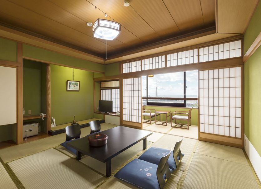 Mikuni Ocean Resort&Hotel in Sakai room with tatami floor and ocean-view balcony