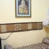 La Isla Bonita Resort Boracay reception desk with wall art and patterned bench seating