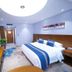 Yangling International Conference & Exhibition Center Hotel in Xianyang, modern guest room with king bed