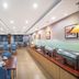 Homeinn Hotel (Anshun Ancient City Gufu Street) dining room with buffet and tables in Anshun