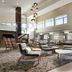 Residence Inn by Marriott Texarkana lobby with lounge seating, tall windows and modern lighting