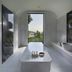 Mandarin Oriental, Bodrum spa suite with soaking tub facing floor-to-ceiling window and sea view