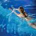 Quality Hotel The Box in Linköping: guest swimming in an indoor blue pool