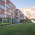 Humber College Lakeshore Residence in Toronto, exterior of brick residence buildings and landscaped lawn