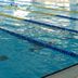 Caro Horoscop Hotel Bucharest indoor lap pool with lane ropes and calm blue water