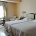 Hotel Aranda in Aranda de Duero twin guest room with two single beds and seating area