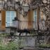 Hotel San Pancrazio in Trescore Balneario: ivy-covered facade with shuttered windows and a small balcony