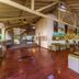 Siddhalepa Ayurveda Resort in Molligoda lobby lounge with seating, mural wall art and polished tile floors