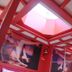 Time Motel in Gyeongju, red-themed room with mirrored ceiling and skylight