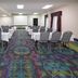 Hampton Inn by Hilton Hopewell Fort Lee meeting room in Hopewell with tables, chairs and projector screen