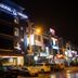 Orkid Inn Mahkota Cheras in Kuala Lumpur exterior at night with streetfront signage and parked cars