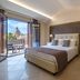 Vittorio Emanuele Boutique Hotel Sciacca room with balcony view of a domed landmark