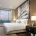 137 Pillars Residences Bangkok room with city view, king bed, and large window