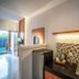 Dikubu Bali Villa And Suites North Kuta kitchenette with sink, mini fridge and tiled backsplash
