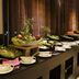 Royal Orchid Central Jaipur buffet table with salads, bowls, and plated dishes in Bani Park