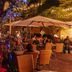 Mercure Grand Hotel Biedermeier Wien outdoor courtyard dining in Vienna with string lights and umbrellas