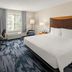 Fairfield by Marriott Inn & Suites Portland West/Beaverton room with king bed, desk and window in Beaverton