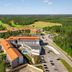 Aerial view of Holiday Club Vierumäki in Vierumäki with forest, parking lot, and outdoor pool
