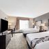 Best Western Inn & Suites - Midway Airport in Burbank room with two beds and desk