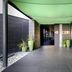 Covered entrance walkway at Hilton Garden Inn Venice Mestre San Giuliano in Venice with potted plants