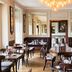 Hotel Du Vin & Bistro Tunbridge Wells dining room in Royal Tunbridge Wells with tables, chairs and chandelier