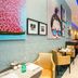 Leonardo Hotel Madrid City Center lobby lounge with seating and colorful wall art in Madrid