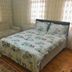 Penguen House & Bungalows in Sapanca: bedroom with bed, sofa, and sheer curtains