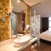 Mercure Selangor Selayang room in Batu Caves with glass bathroom, double bed and window view