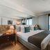 Pestana Rio Atlântica hotel room with king bed and balcony ocean view in Rio de Janeiro